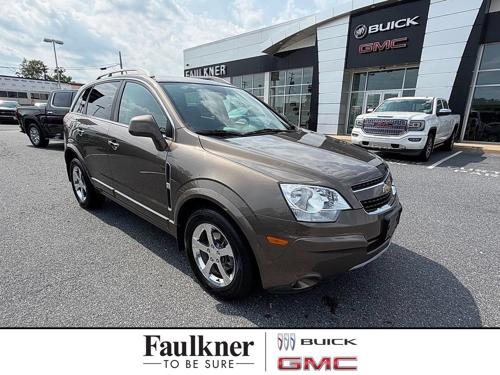 2014 Chevrolet Captiva LT in Brownstone Metallic — front three-quarter view
