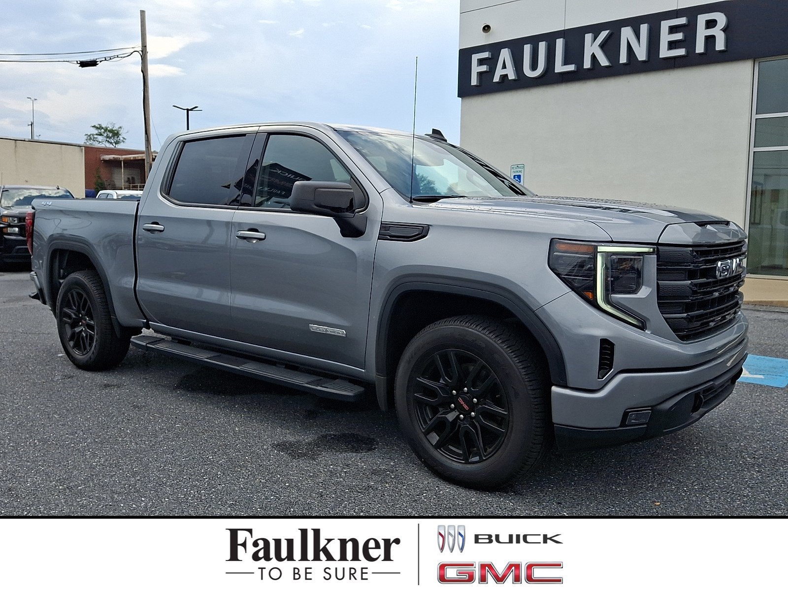 2023 GMC Sierra 1500 Elevation in Sterling Metallic — front three-quarter view
