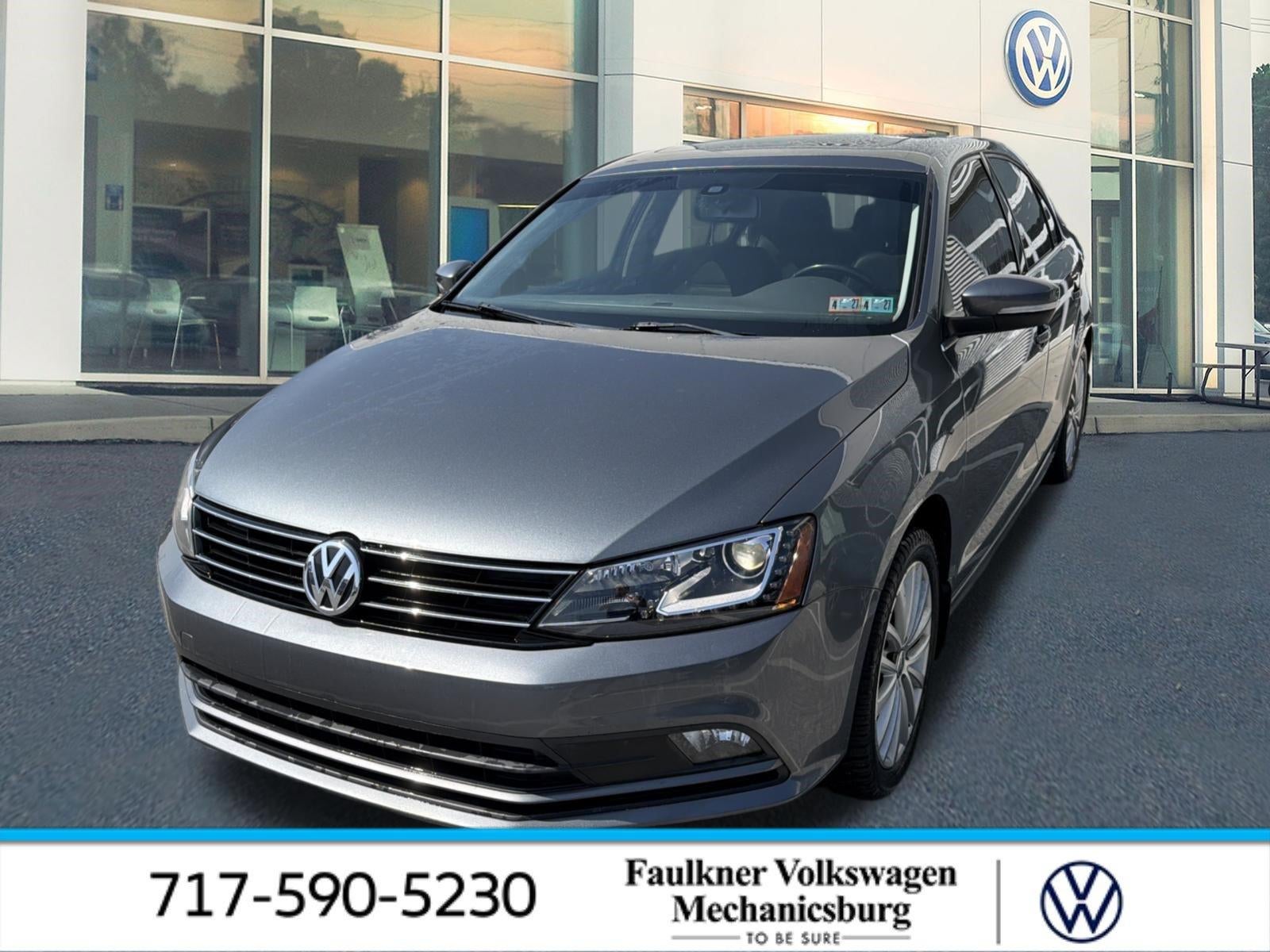 2016 Volkswagen Jetta 4dr Auto 1.8T SEL PZEV Sedan in Platinum Gray Metallic — front three-quarter view
