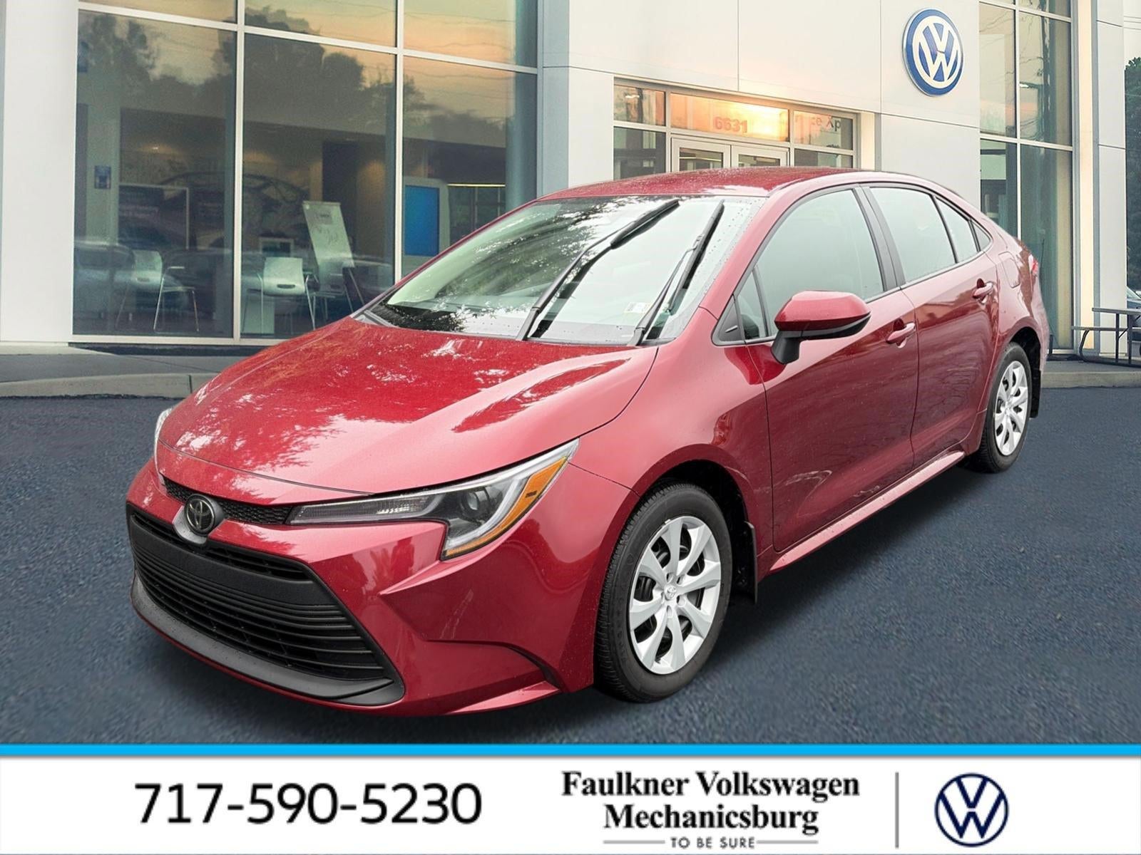 2025 Toyota Corolla LE CVT (Natl) in Pearl — front three-quarter view