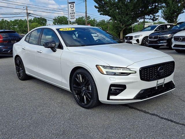 2024 Volvo S60 B5 AWD Plus Black Edition in Crystal White Metallic — front three-quarter view