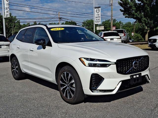 2024 Volvo XC60 B5 AWD Core Dark Theme in Crystal White Metallic — front three-quarter view