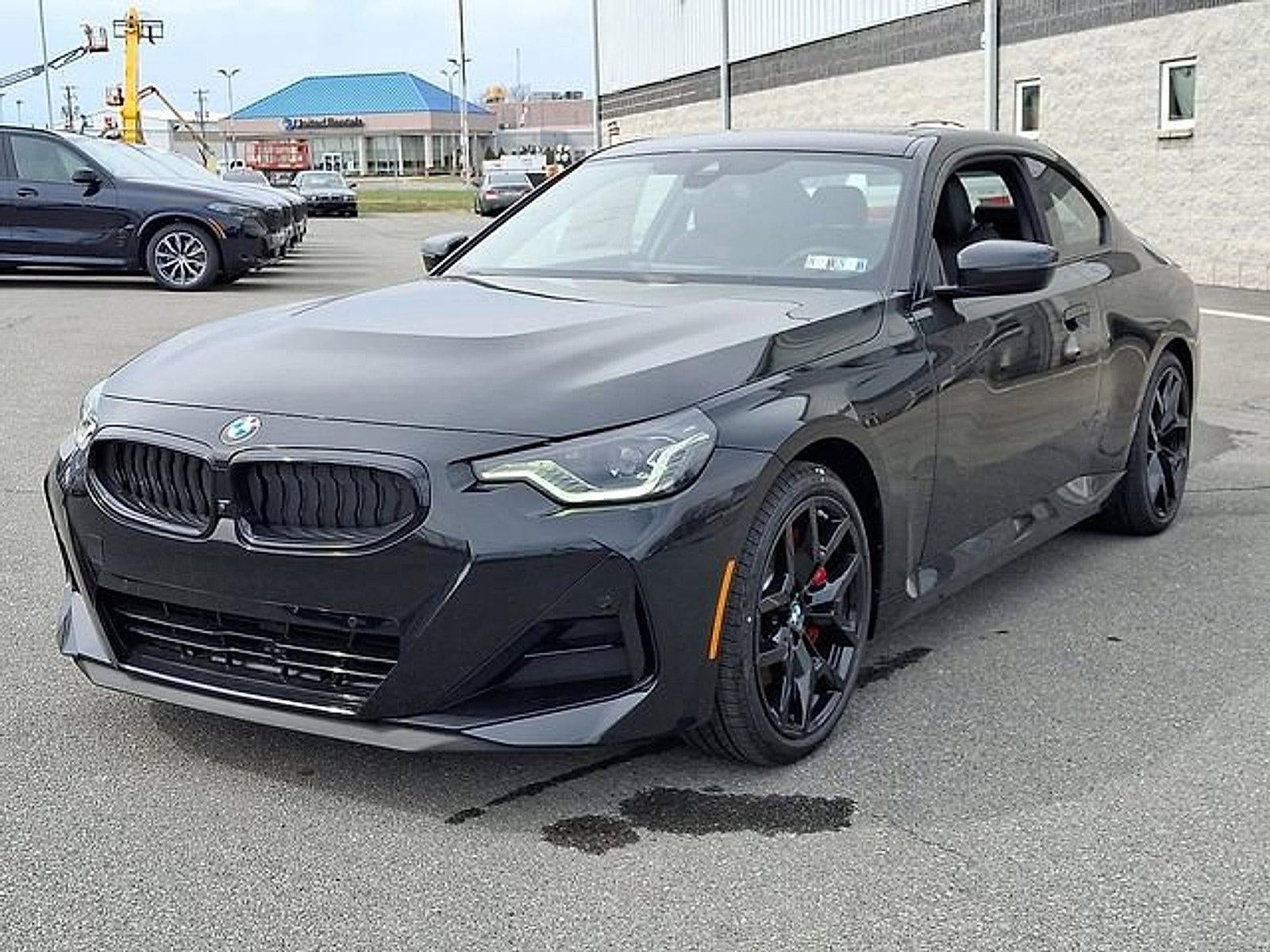 2026 BMW 230i xDrive — side profile view