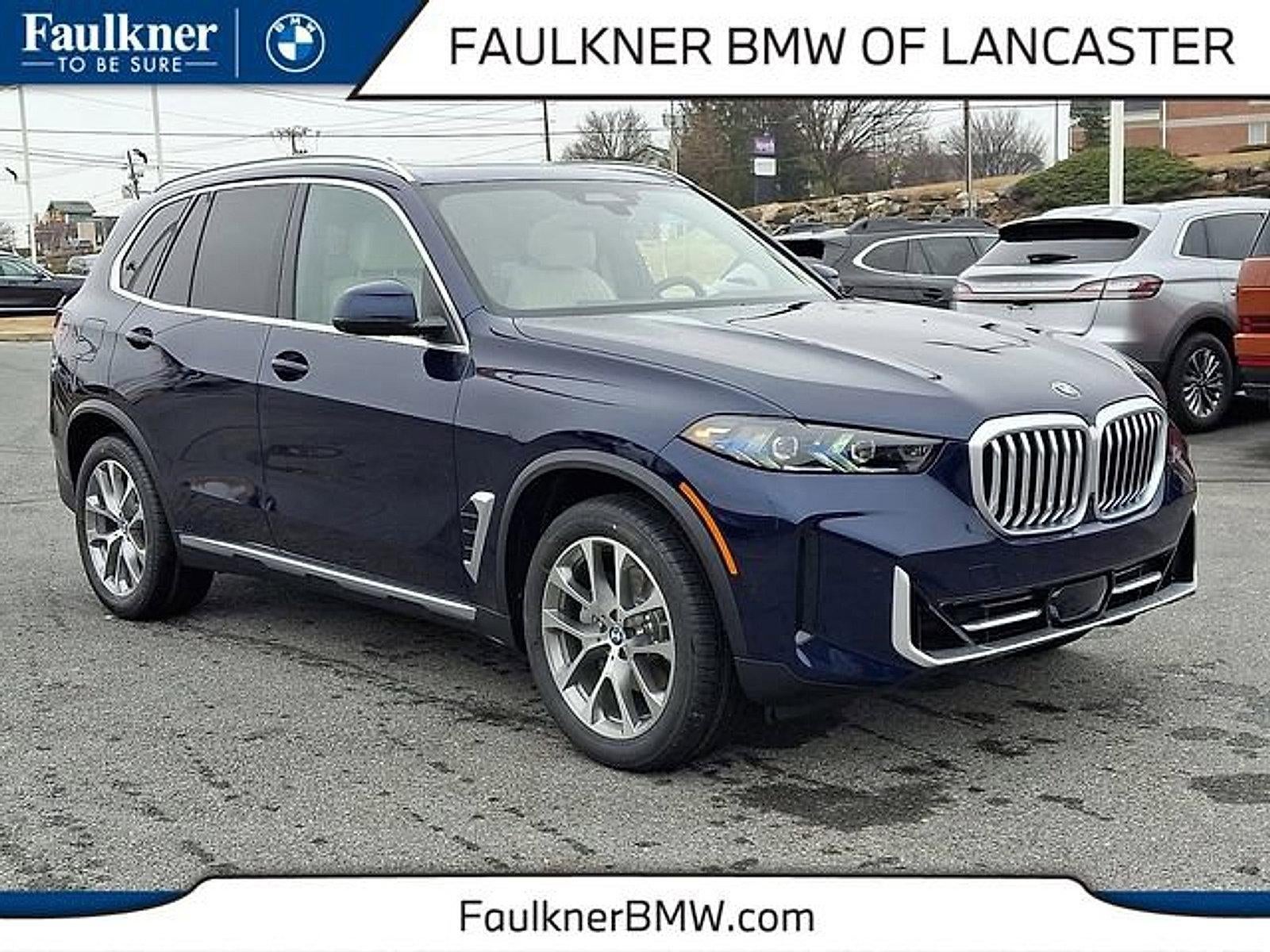 2026 BMW X5 xDrive40i Sports Activity Vehicle in Tanzanite Blue II Metallic — front three-quarter view