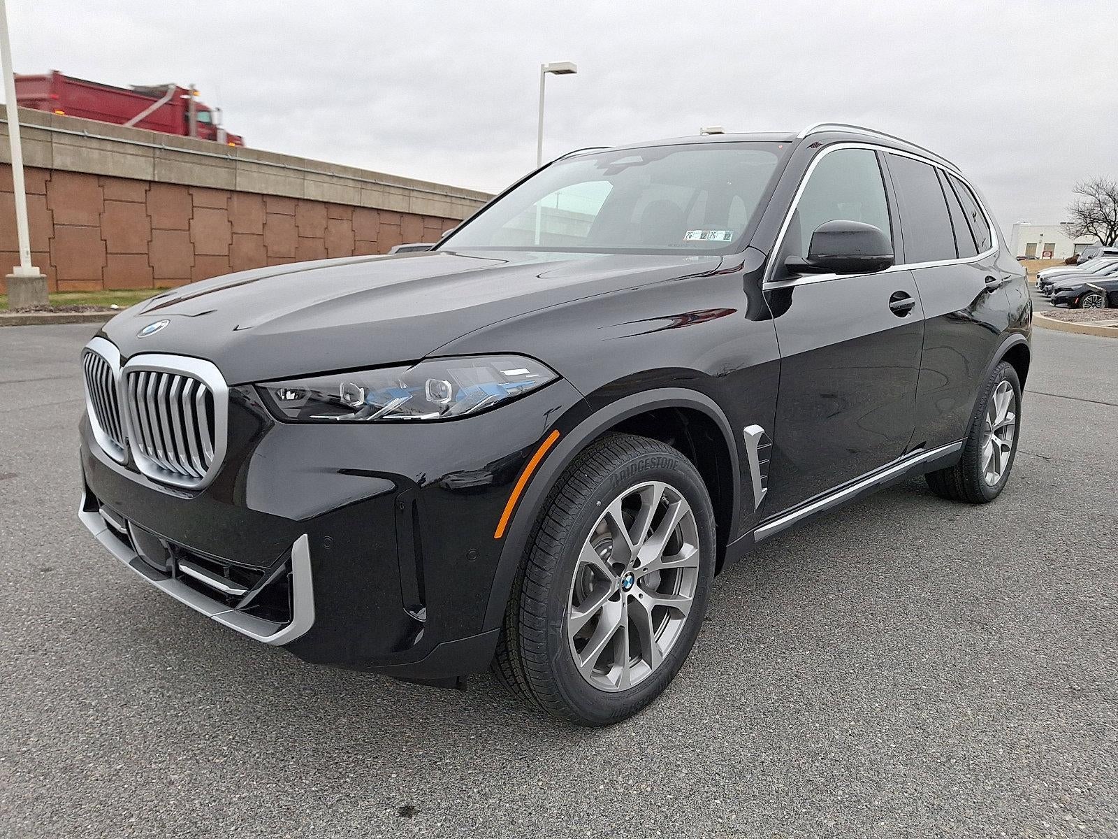 2026 BMW X5 xDrive40i — rear three-quarter view
