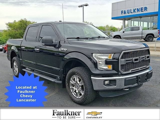2016 Ford F-150 XLT in Shadow Black — front three-quarter view