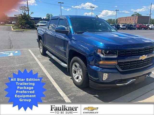 2016 Chevrolet Silverado 1500 LT in Deep Ocean Blue Metallic — front three-quarter view