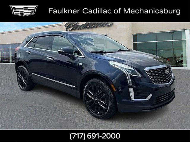 2022 Cadillac XT5 Luxury in Dark Moon Blue Metallic — front three-quarter view